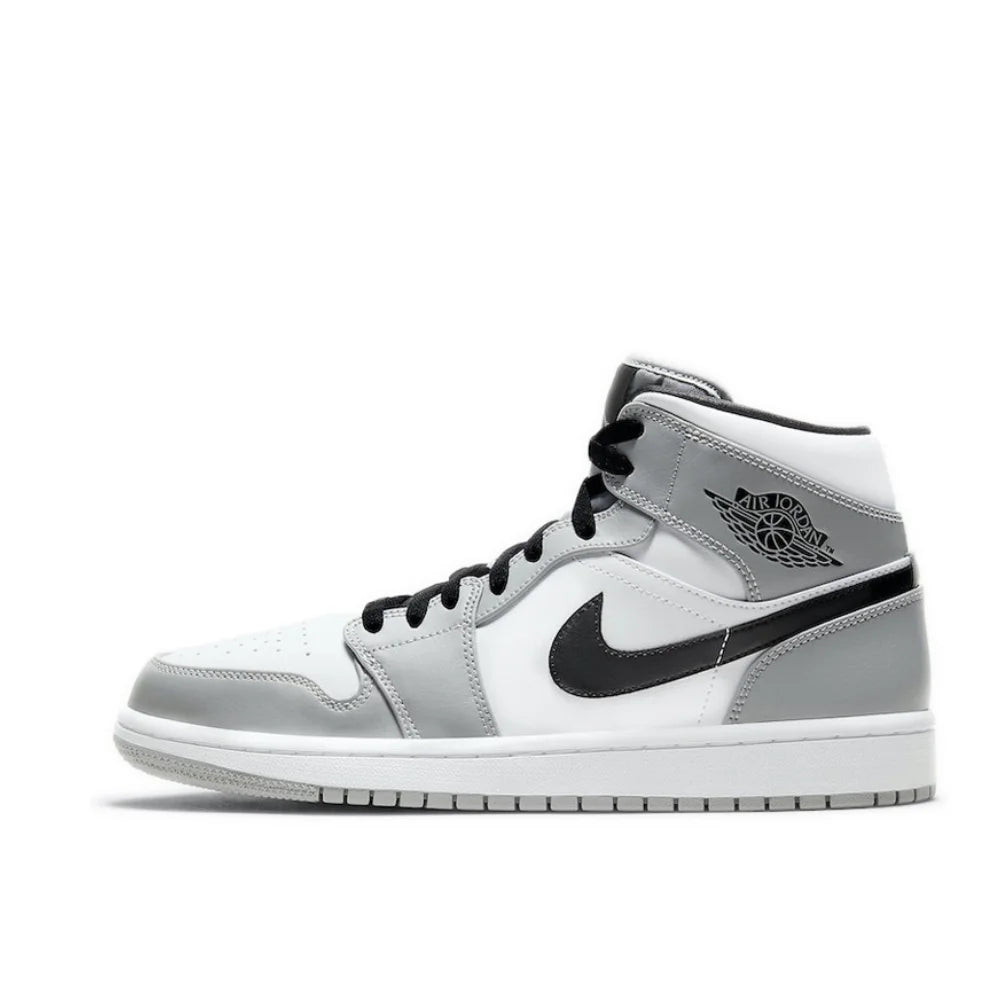 Nike Air Jordan 1 Mid "Light Smoke Grey" – L'Héritage du Basket dans un Design Rétro Élégant